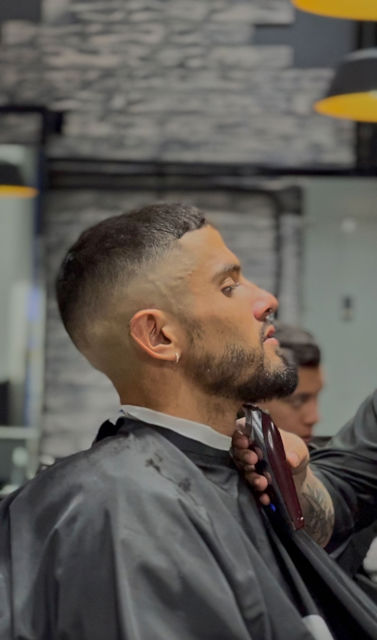 Arreglo de barba en la silla